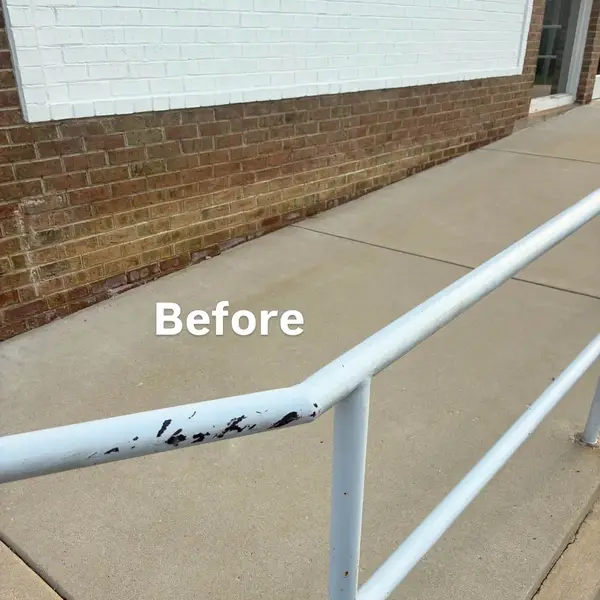 Before detail of chipped commercial handrail paint in Berlin