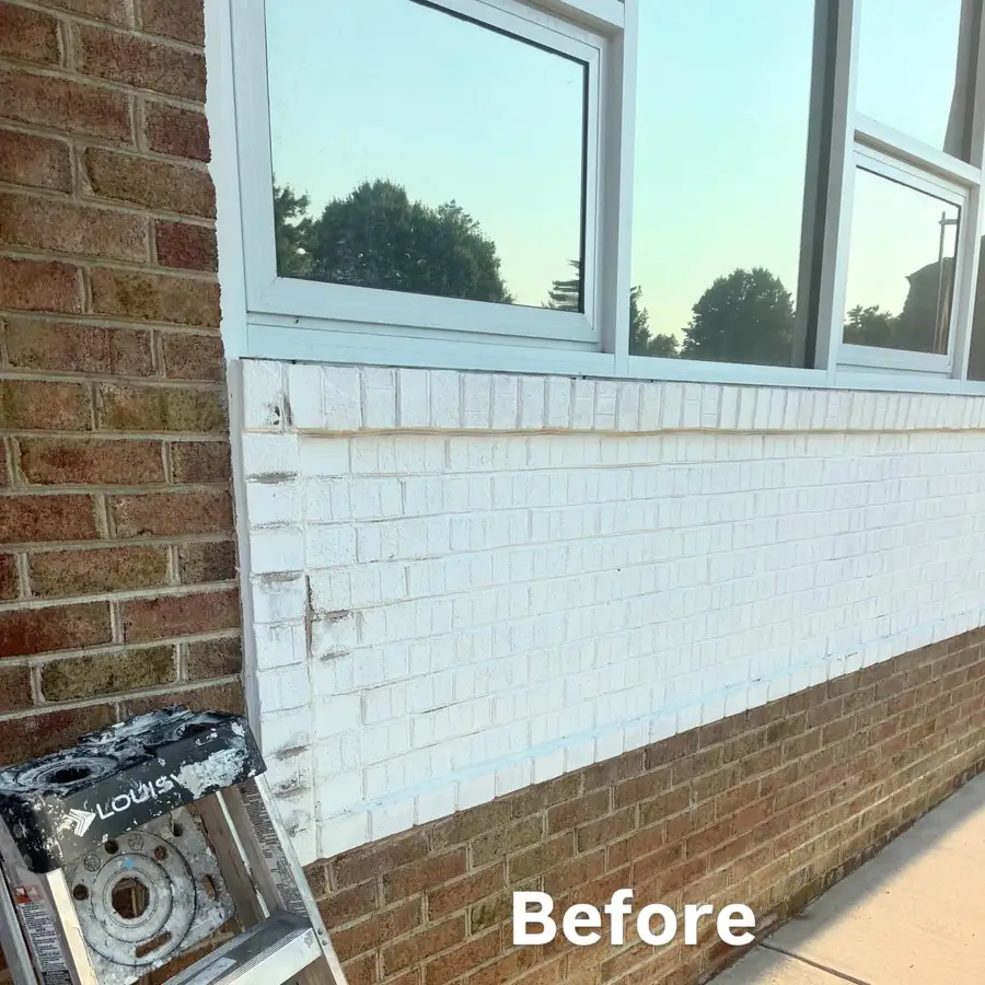 Before view of painted brick at a Berlin commercial property