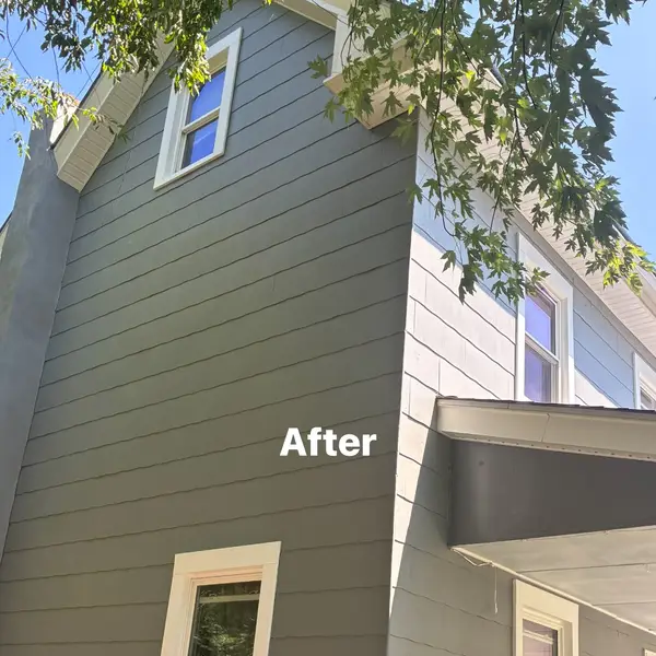After detail of Cityscape gray siding and white trim in Clayton