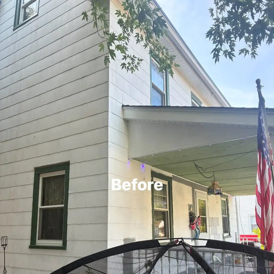 Before detail of the side porch and exterior siding in Clayton