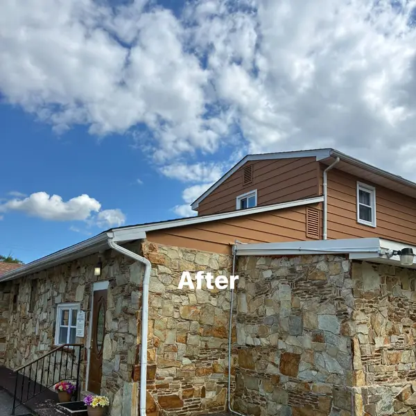 Franklinville church after its exterior was painted Smokey Topaz by JM Painting Services