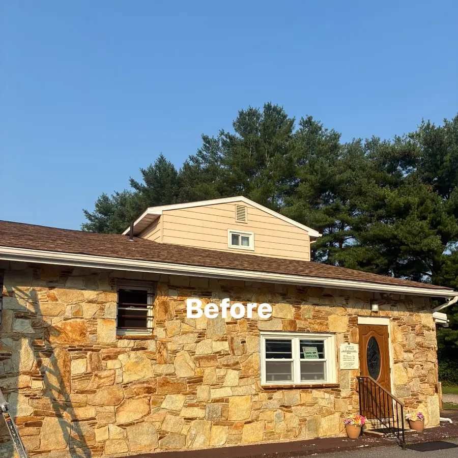 Before view of the Franklinville church exterior and stone façade