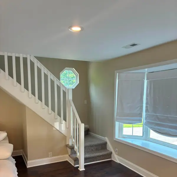Finished staircase and window wall in Pine Hill