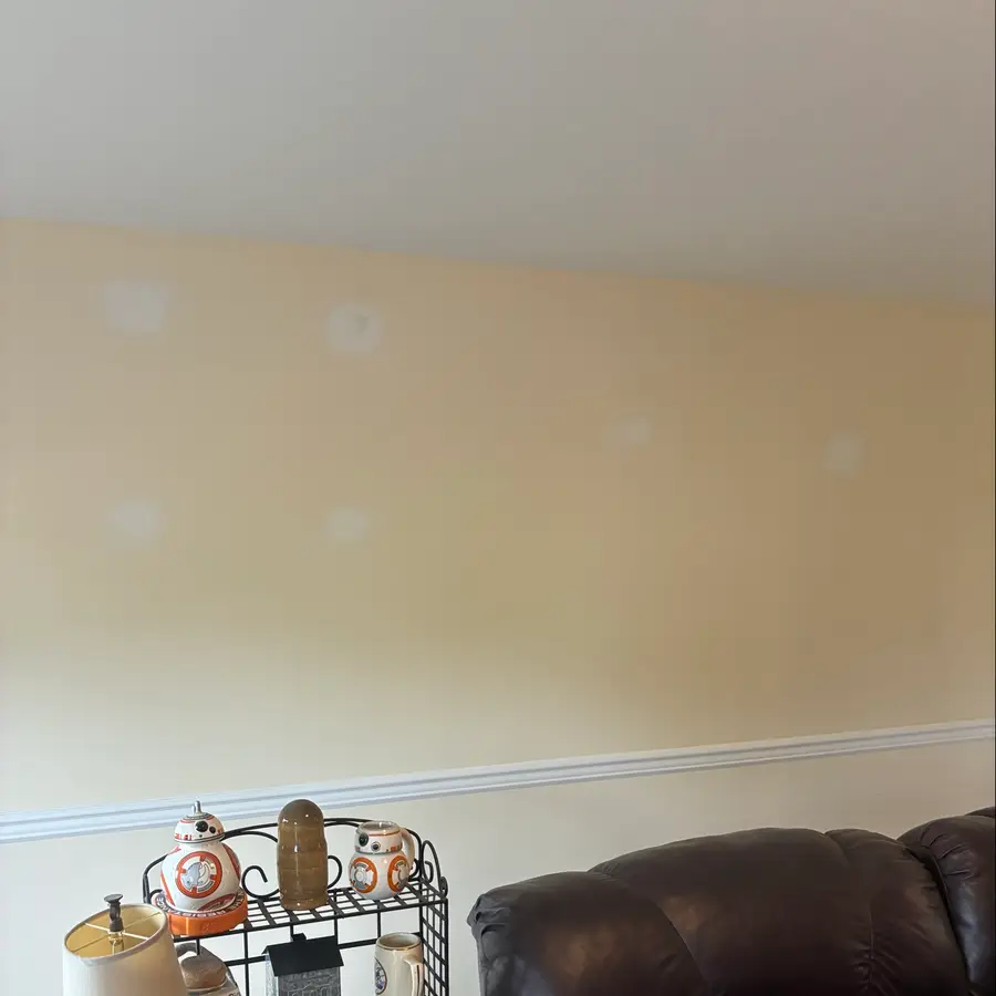 Interior wall with prepared patch areas before painting