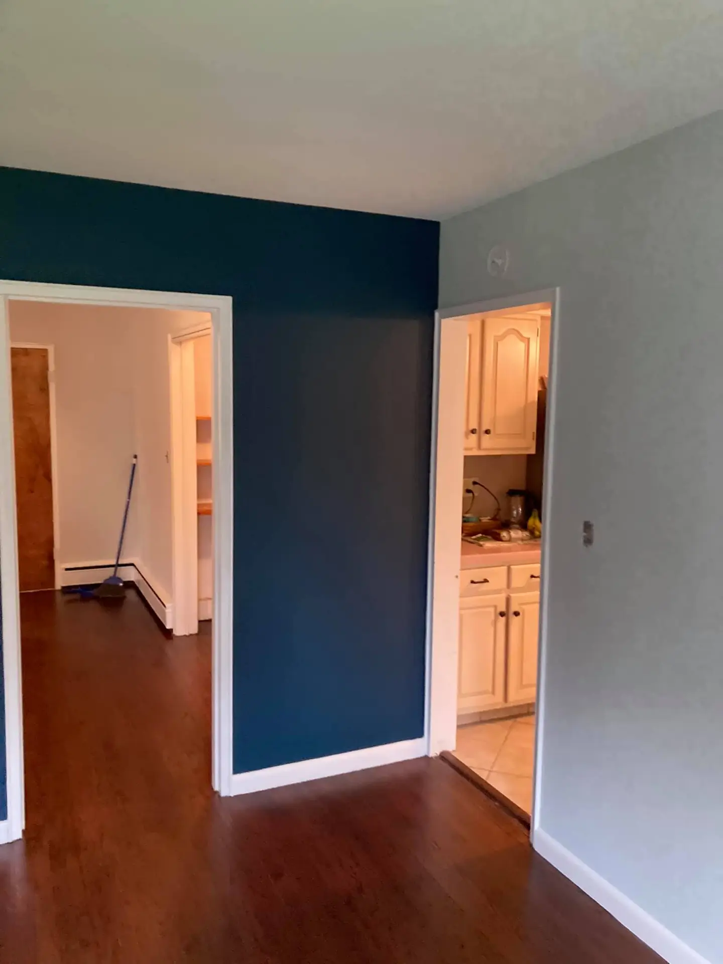 Deep navy accent wall interior painted by JM Painting Services in South Jersey