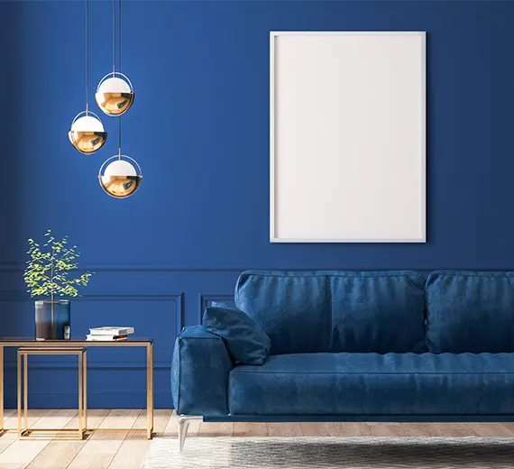 A color-drenched navy living room painted by JM Painting Services